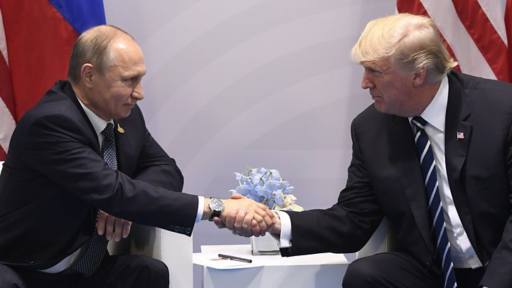 Media captionWhat Trump said of his first, formal meeting with Putin