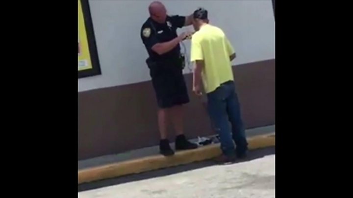 Video captures Florida officer helping homeless man shave