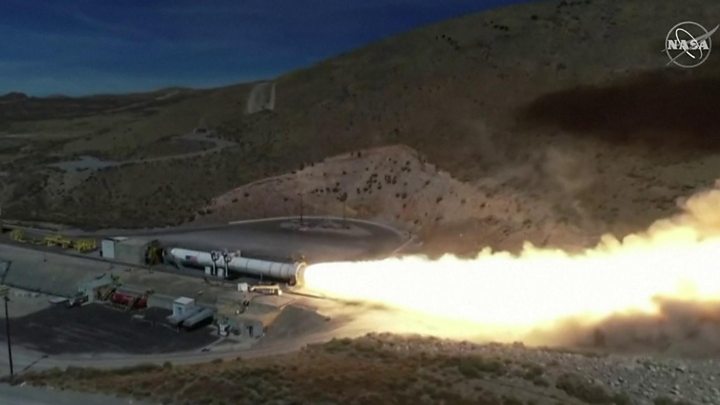 Moon booster rocket fired up in critical test - BBC News