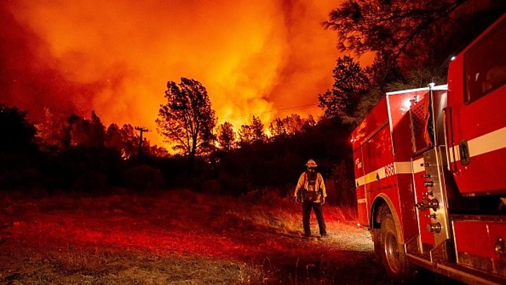 US West Coast fires: Row over climate change's role as Trump visits