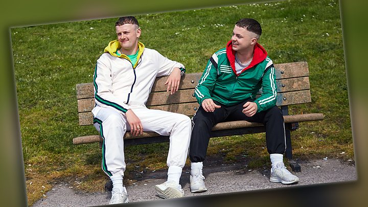 The Young Offenders on a bench