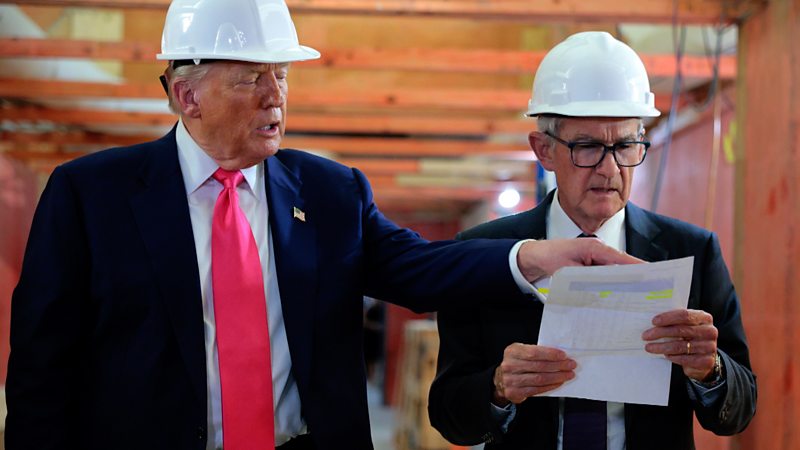 Watch: Trump jokes he wants Powell to lower interest rates in awkward exchange