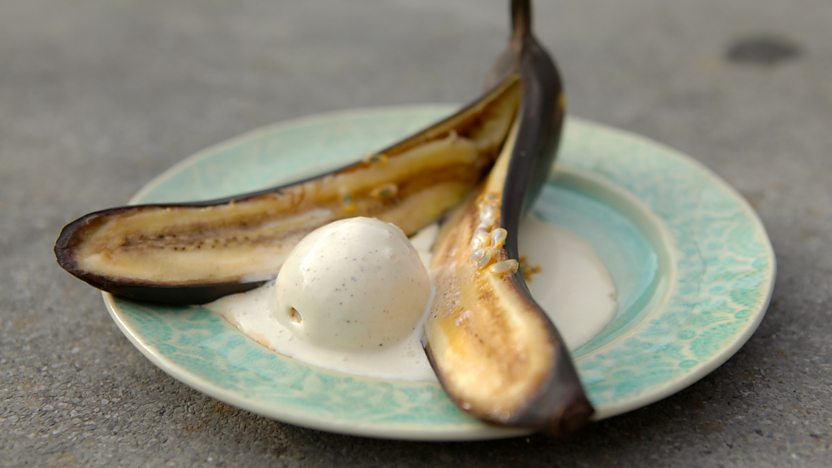 Charred bananas and ice cream with passion fruit soufflé and sesame-toffee bananas