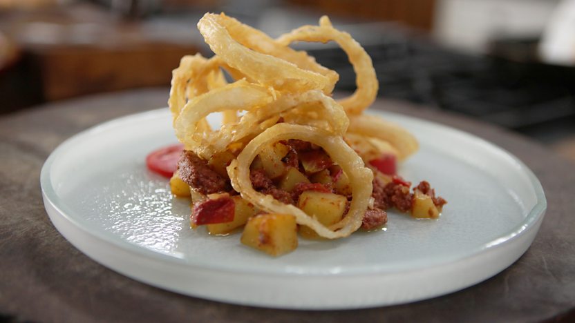 Corned beef hash with beer-battered onion rings