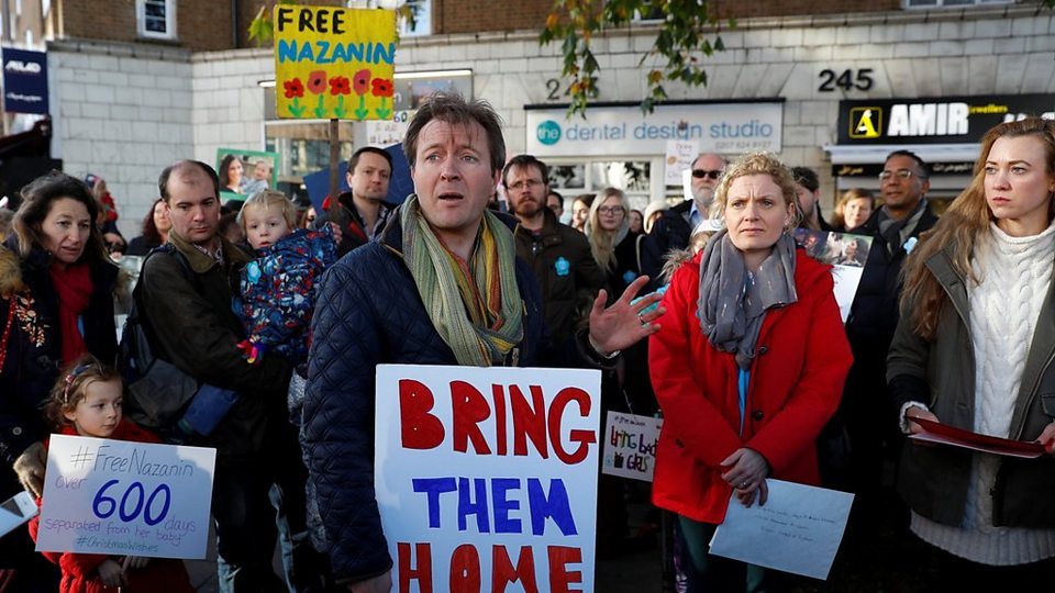Nazanin Zaghari-Ratcliffe speaks on phone during march