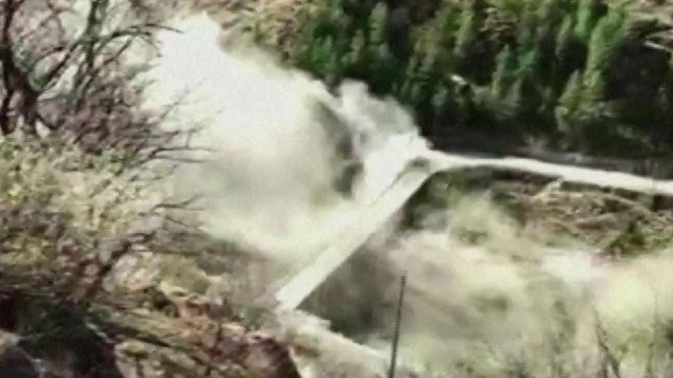 The moment the deluge of water washed away parts of the dam
