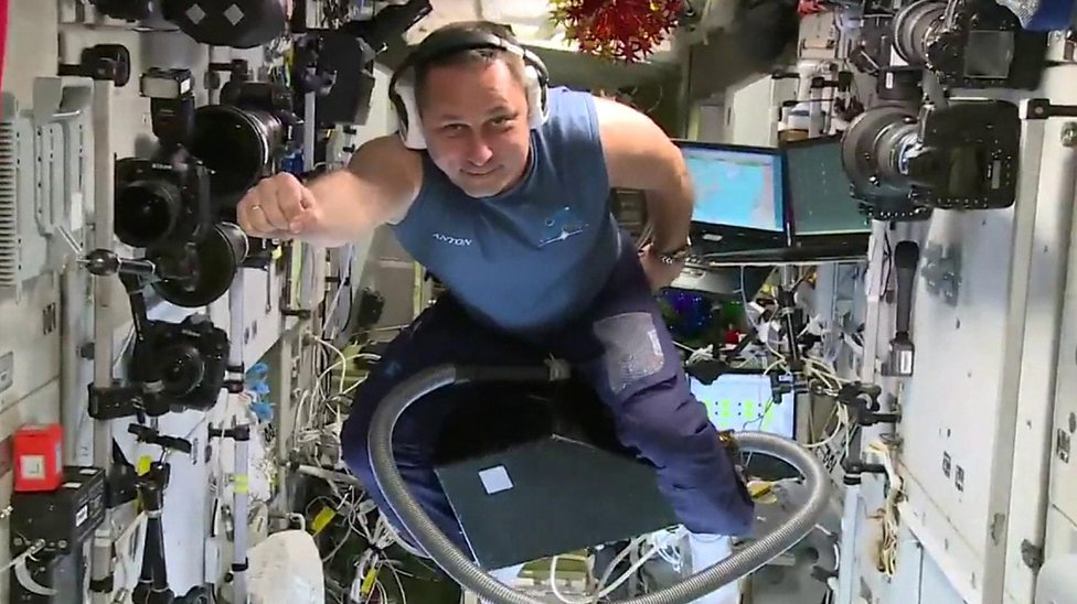 Cosmonaut flies vacuum cleaner in International Space Station CBBC