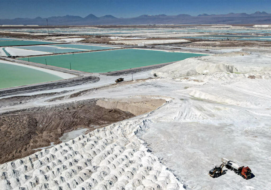 A mining machine moves a salt by-product at a lithium mine in Chile