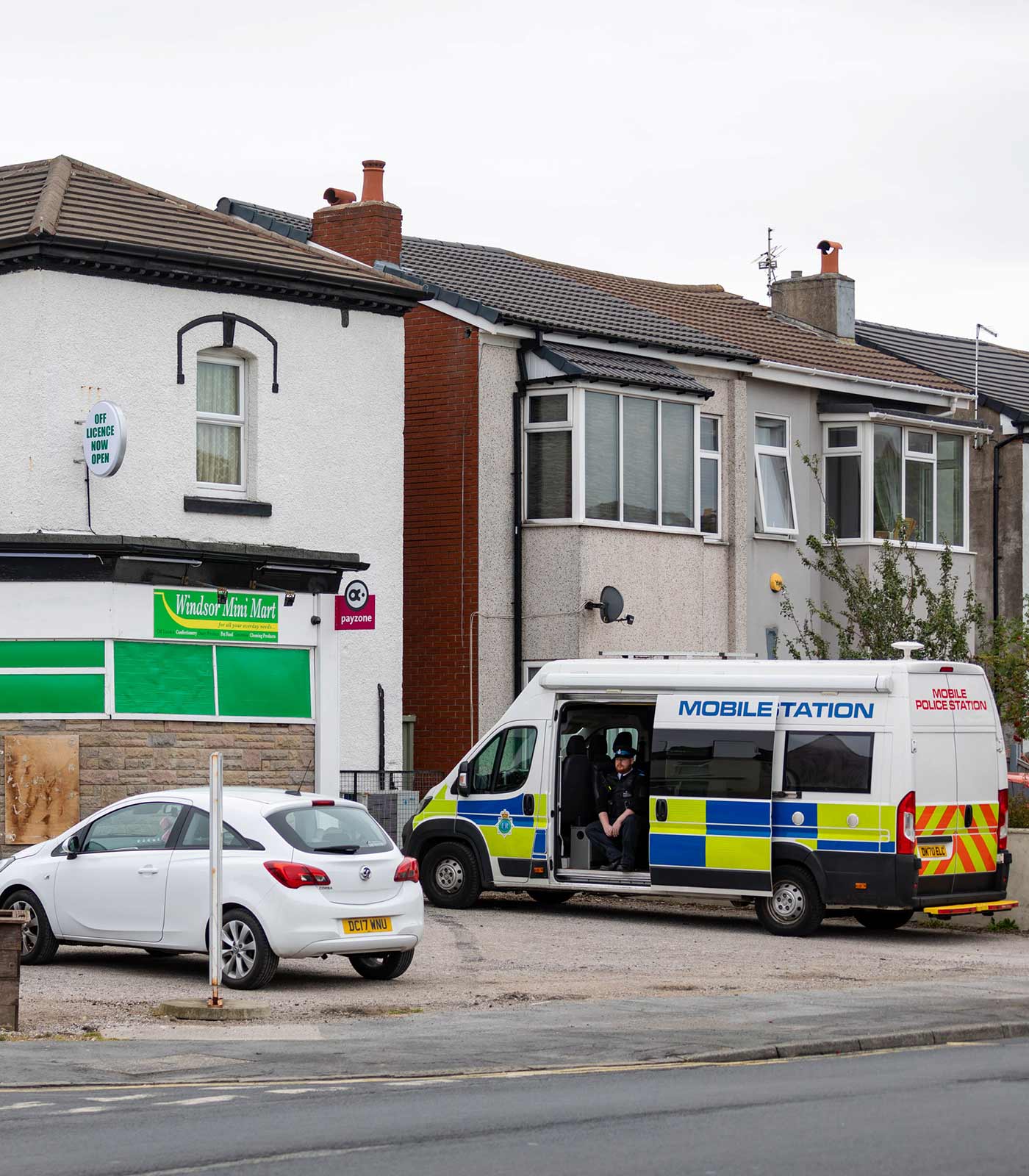 A police vehicle outside the Windsor Mini Mart - 8 August 2024