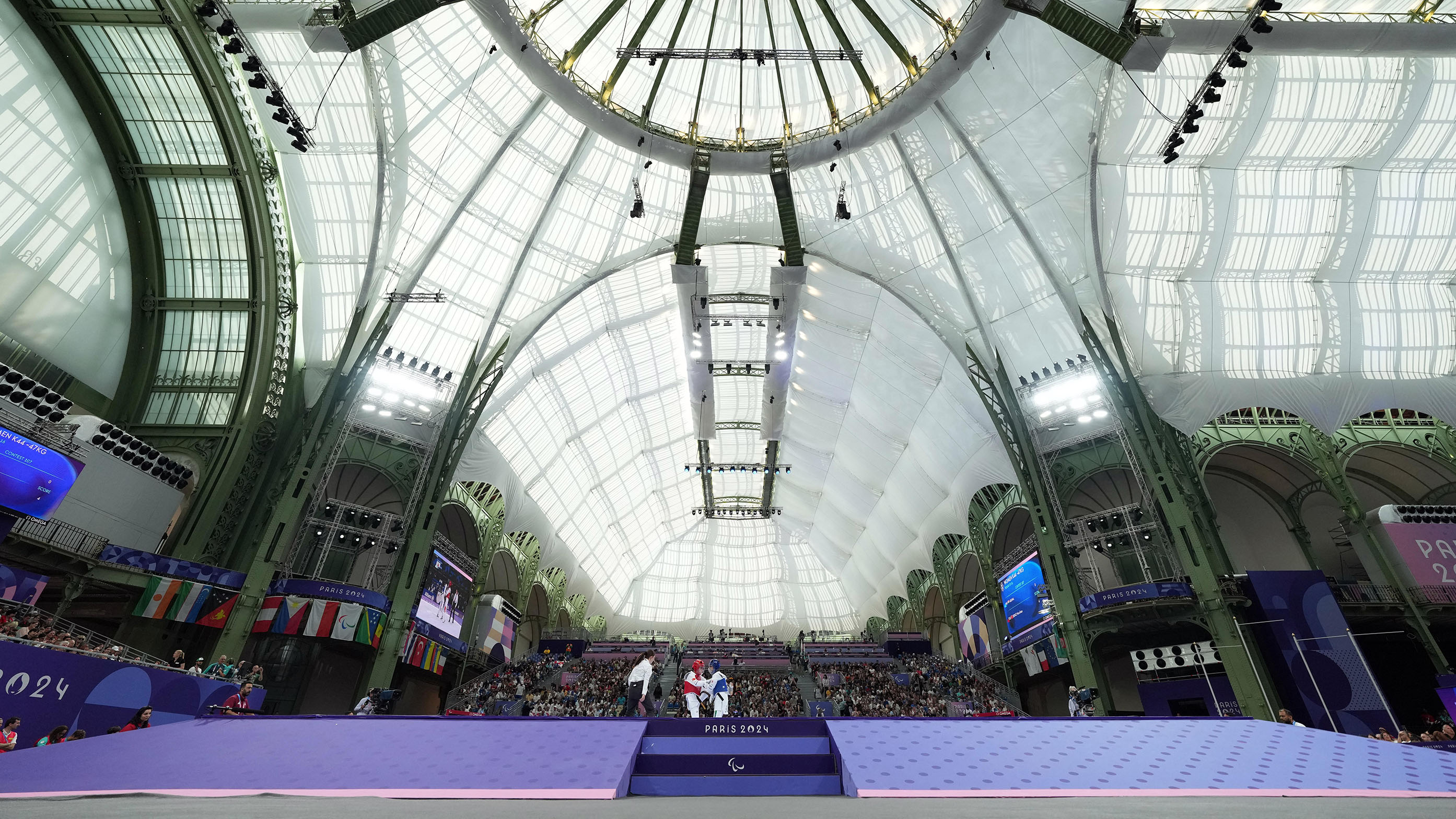 Aruna of India against Nurcihan Ekinci of Turkey in the Women's Taekwondo in the Grand Palais, Paris