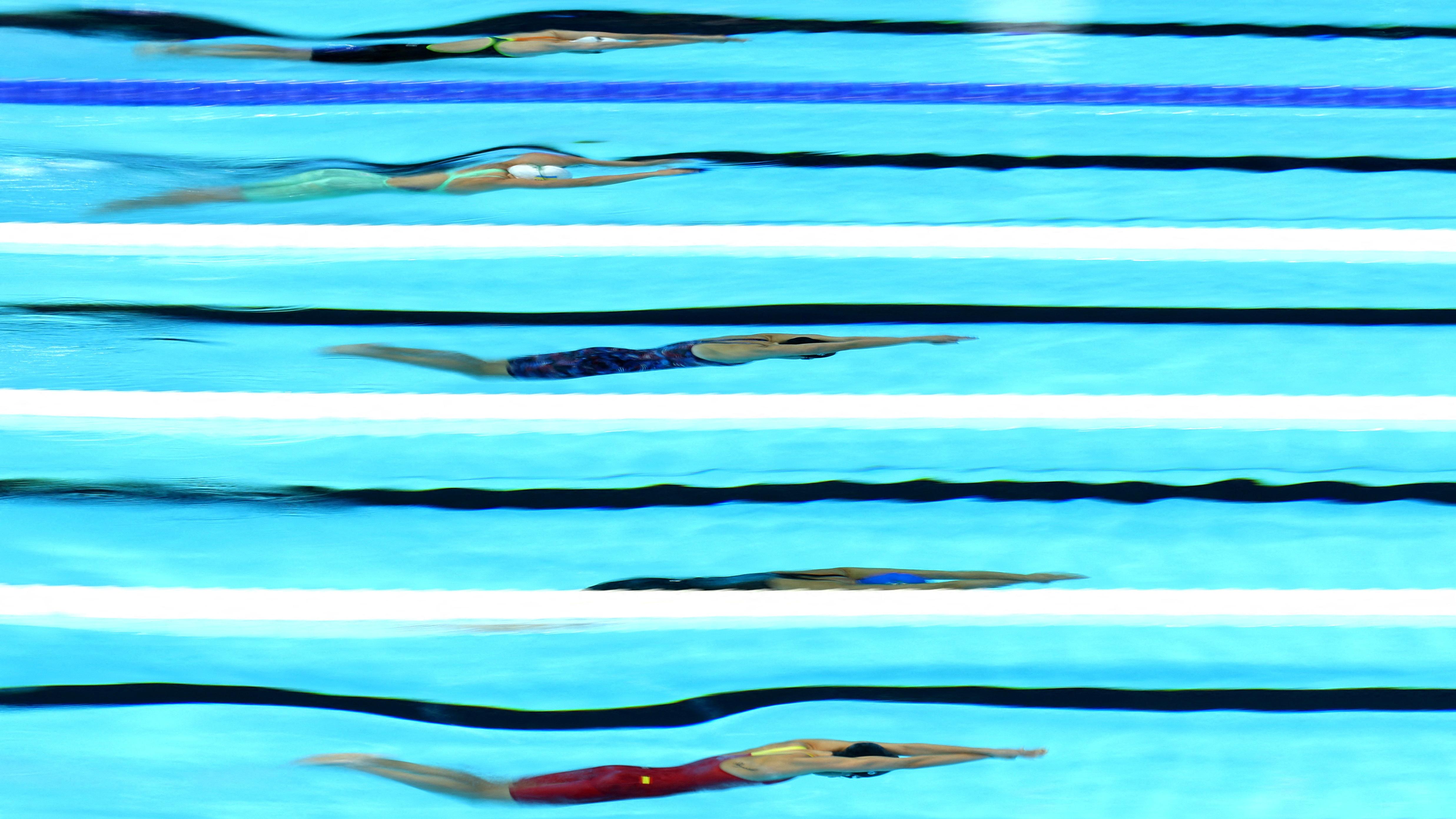 Paralympic swimmers during a race at the 2024 Paris Games