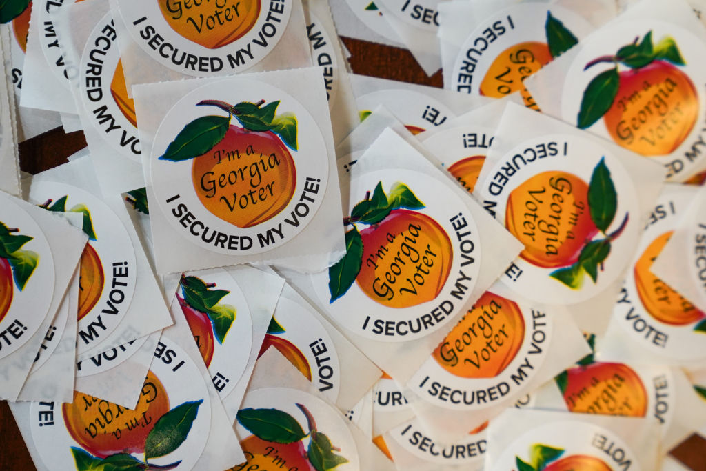 tickers sit on a table on the first day of early voting at Atlanta Metropolitan State College on October 15, 2024 in Atlanta, Georgia.