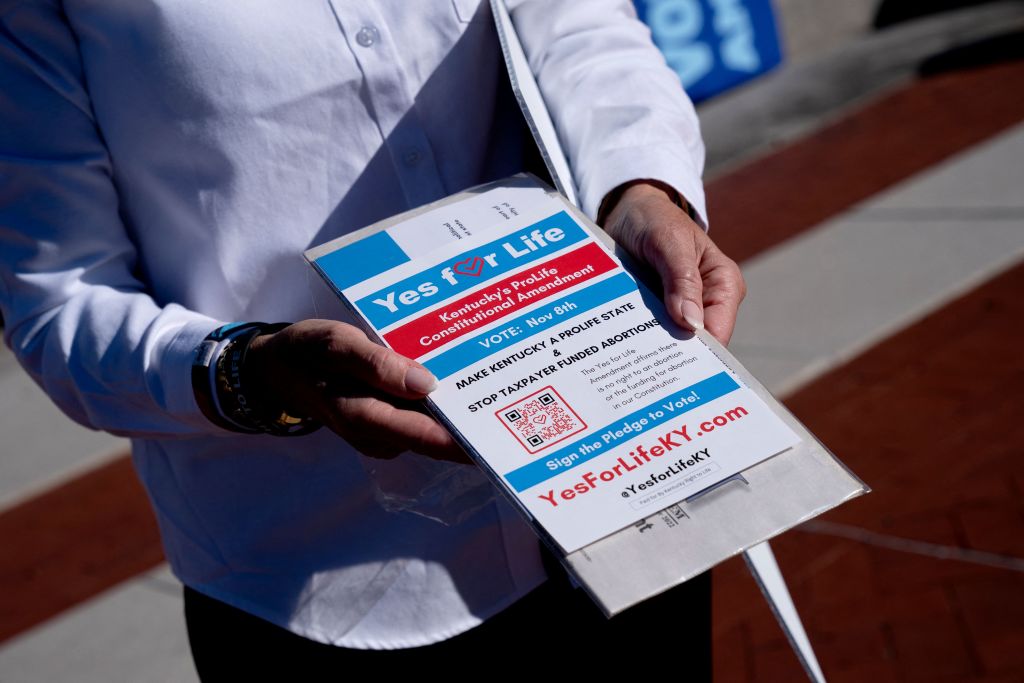 Kentucky Right to Life Executive Director Addia Wuchner, a former Republican state representative, displays a brochure during an interview following a rally to encourage voters to support Amendment 2 to add a permanent abortion ban to Kentuckys state constitution, on the steps of the Kentucky State Capitol in Frankfort, Kentucky, on October 1, 2022.