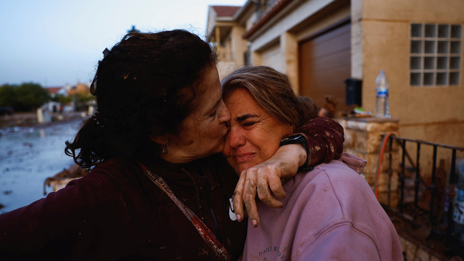 Two women share a hug