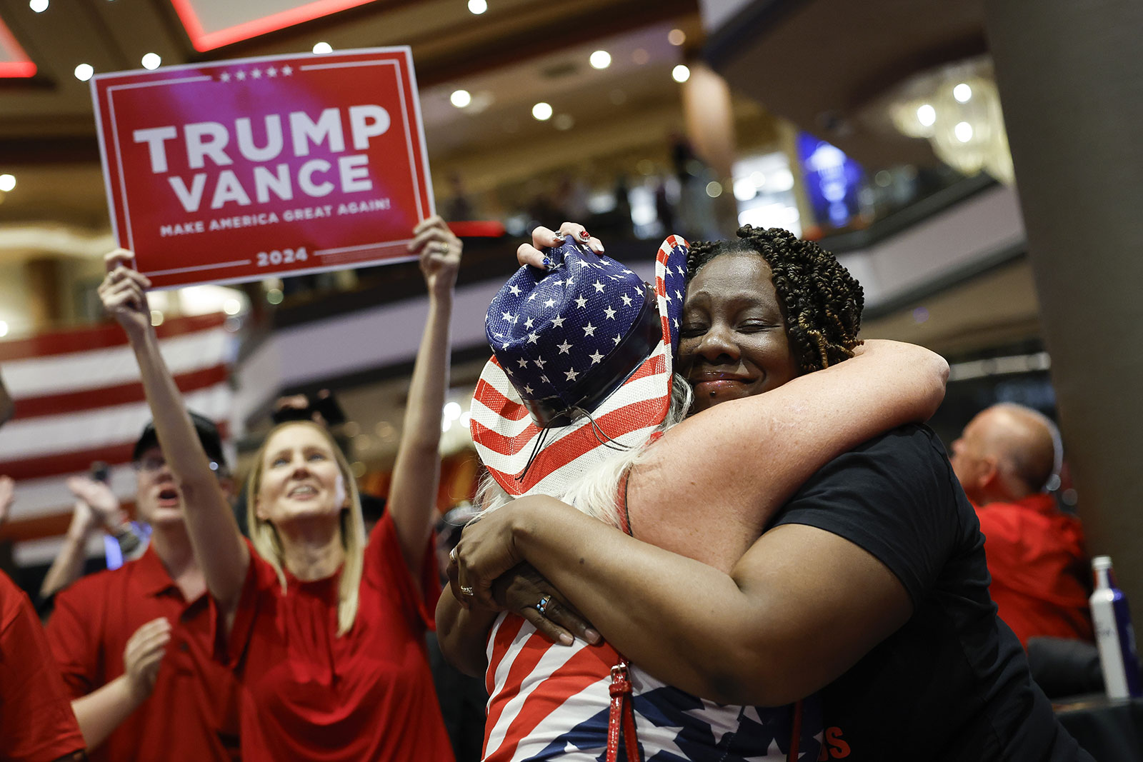 People attend the Nevada Republican Party watch party at the Ahern Hotel in Las Vegas (Caroline Brehman/EPA)