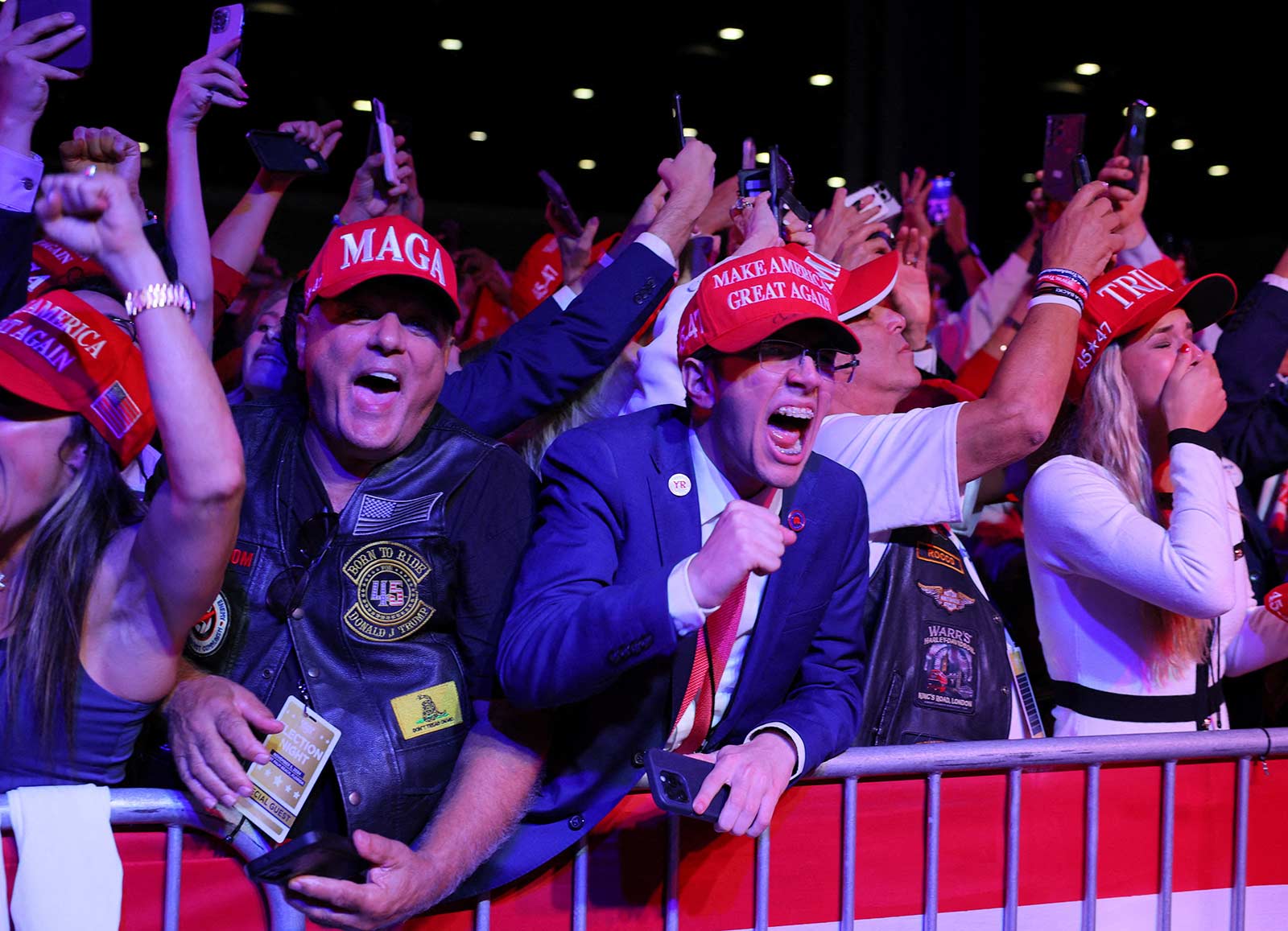 Donald Trump supporters celebrate after the Fox Network called the election for him (Brian Snyder/Reuters)