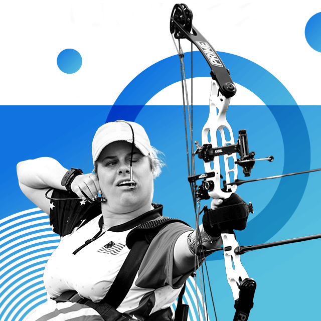 Paralympian Tracy Otto pictured in competition with a concentrated look, with the bow up in one hand and a device over her head and into her mouth to release the arrows.