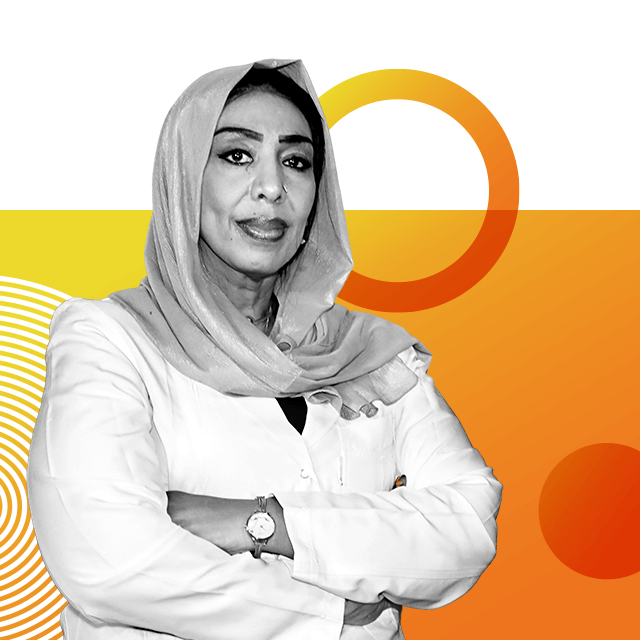 Obstetrician Safa Ali wearing a headscarf and a white medical coat with her arms crossed, and a round watch on her wrist.