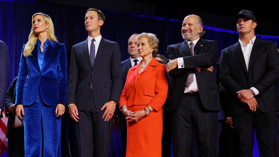 Photo shows family and friends of Donald Trump on stage after his election.