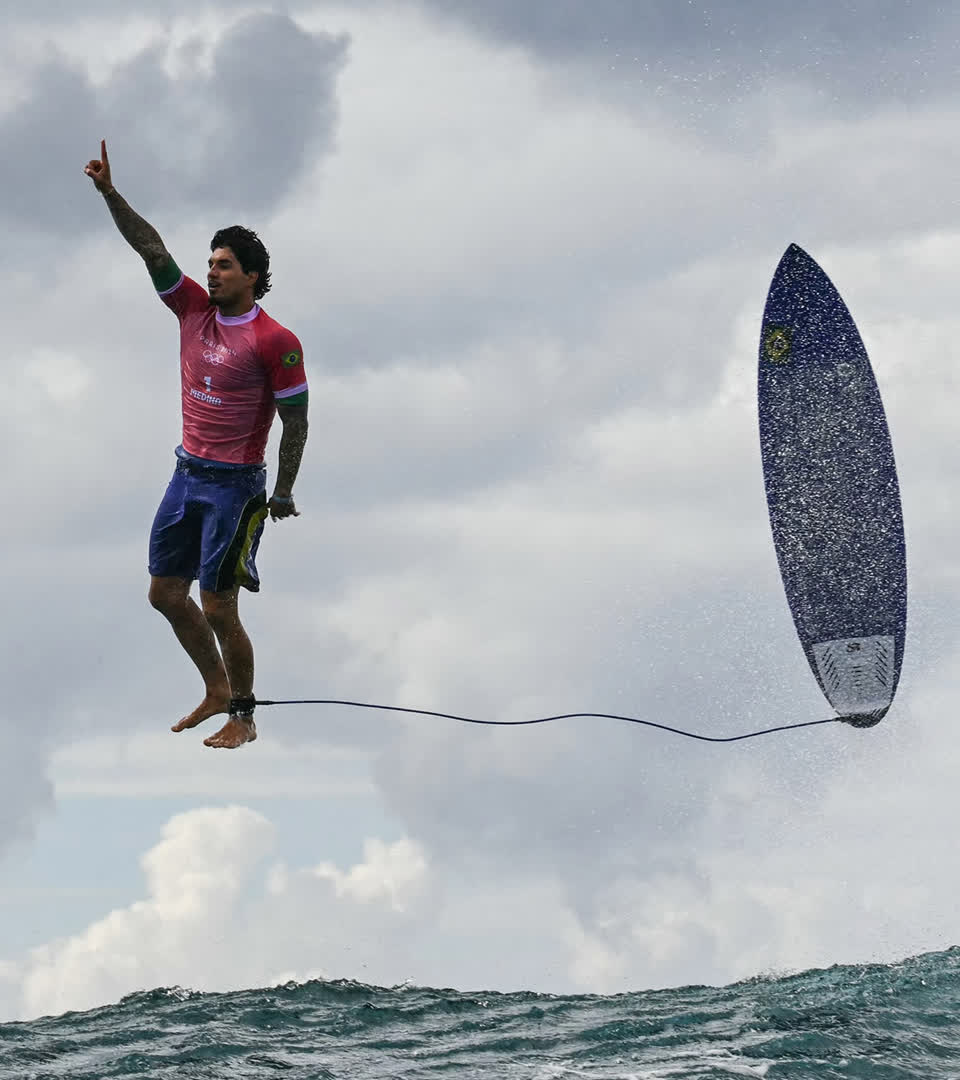 Brazil's Gabriel Medina reacts after getting a large wave in the 5th heat of the men's surfing round 3, during the Paris 2024 Olympic Games, in Teahupo'o, on the French Polynesian Island of Tahiti, on 29 July, 2024.