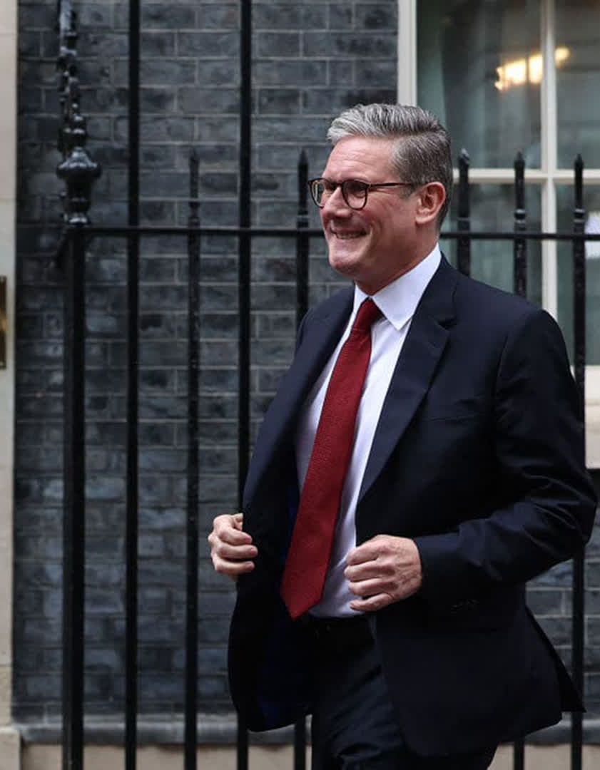 Britain's incoming Prime Minister Keir Starmer walks to the podium to address the nation after his general election victory.