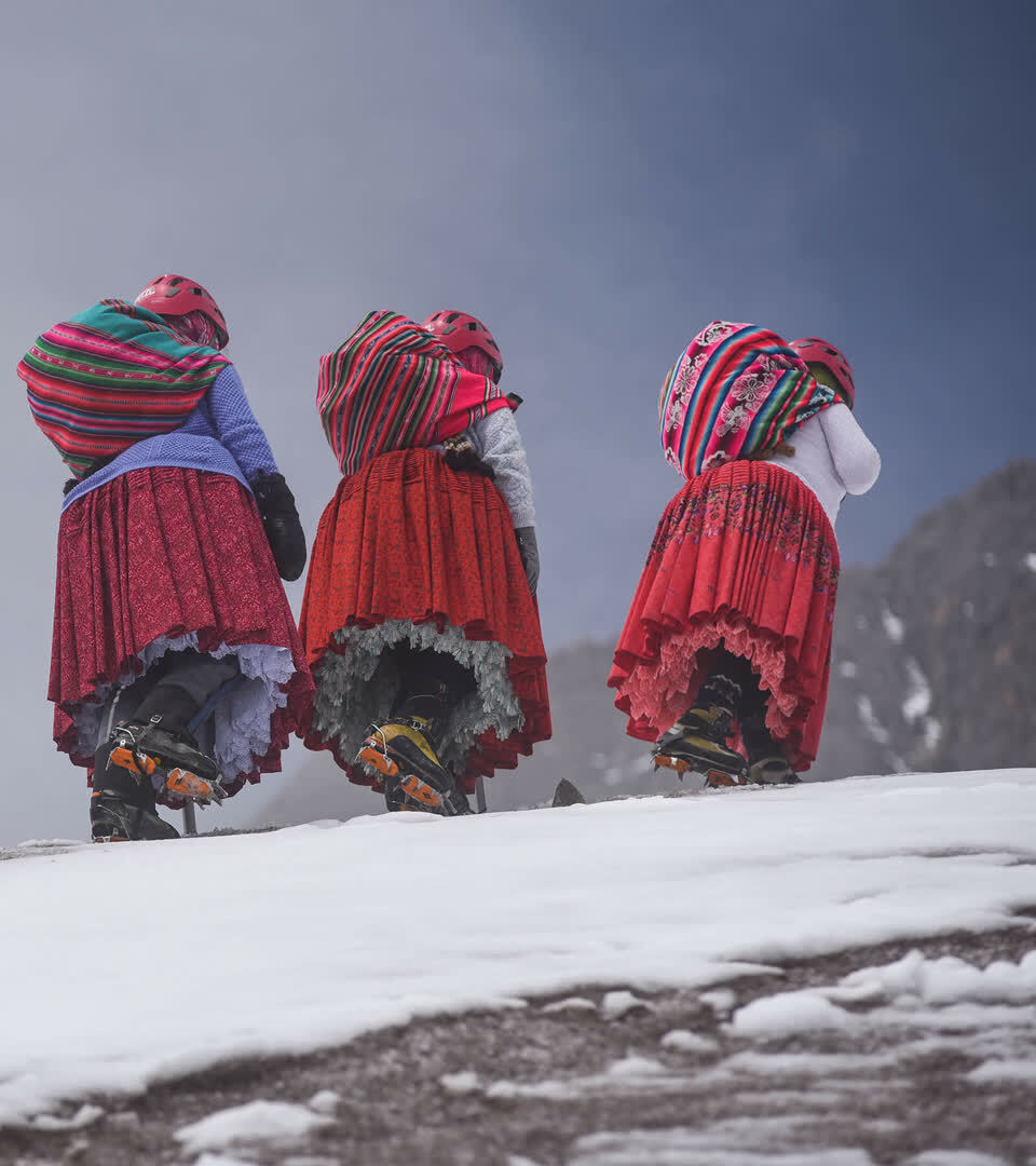 Elena Quispe Tincuta, 26, Julia Quispe Tincuta, 35, Alicia Quispe Tincuta, 40, and Pasesa Alana Llusco, 37, the cholita climb the Huayna Potosi mountain, near El Alto, Bolivia, 28 February 2024