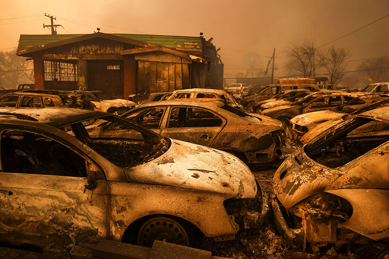 Burned cars in a lot destroyed by the Eaton wildfire in Altadena, California, USA, 08 January 2025.