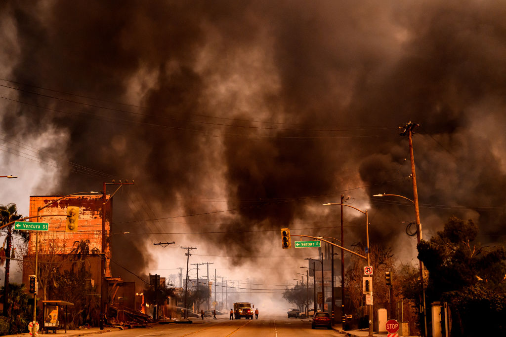 Smoke and flames overwhelmed a commercial area in Altadena