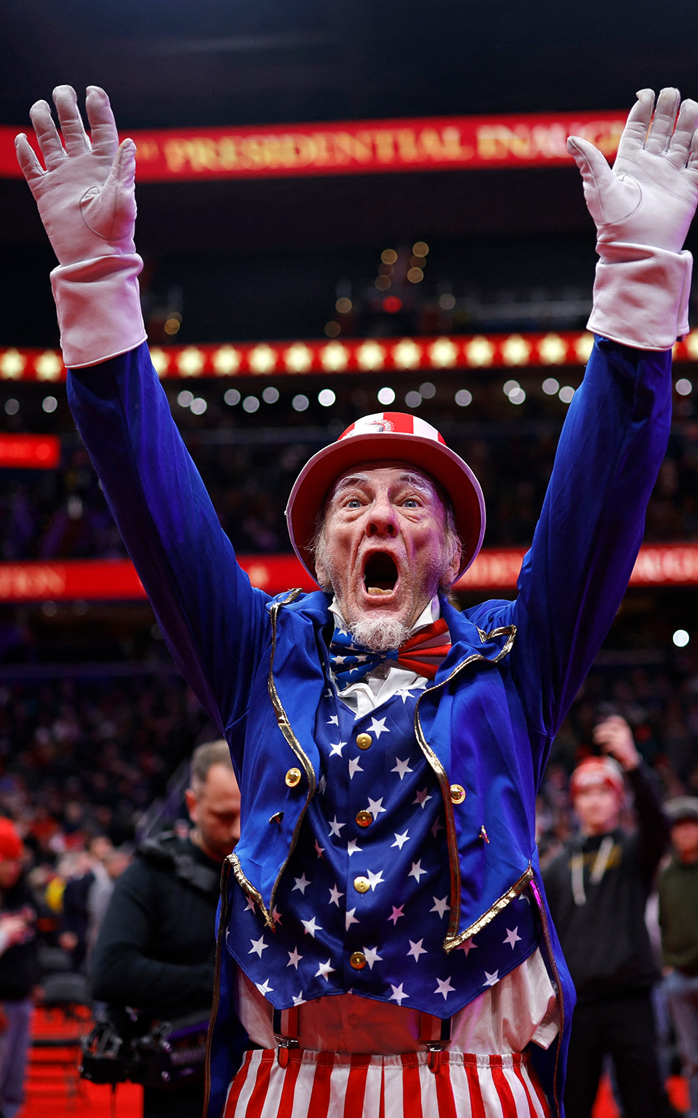 Duane Schwyngel raises his hands inside Capital One arena