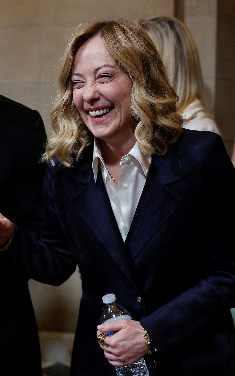 Italian Prime Minister Giorgia Meloni shares a joke wth Argentina's President Javier Milei