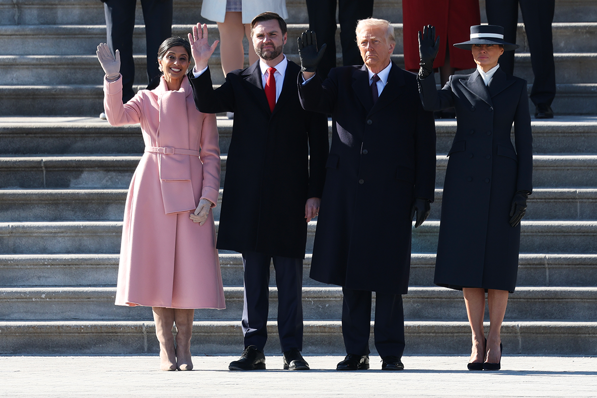 Second lady Usha Vance, U.S. Vice President JD Vance, U.S. President Donald Trump and first lady Melania Trump wave as former US President Joe Biden and former U.S. Vice President Kamala Harris depart the US Capitol on January 20, 2025 in Washington, DC