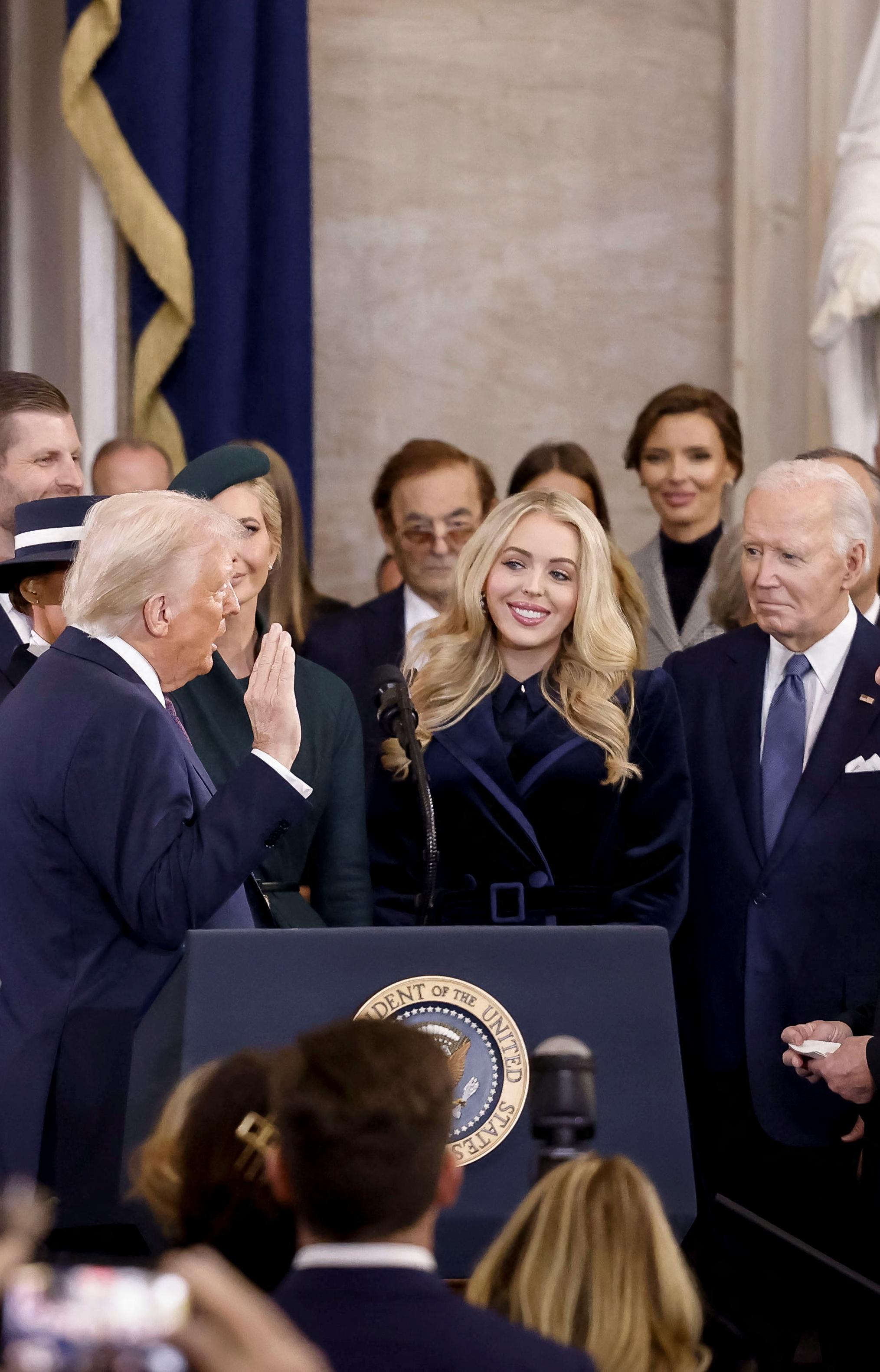 US Supreme Court Chief Justice John Roberts administers the presidential oath to Donald Trump in the rotunda of the United States Capitol in Washington DC