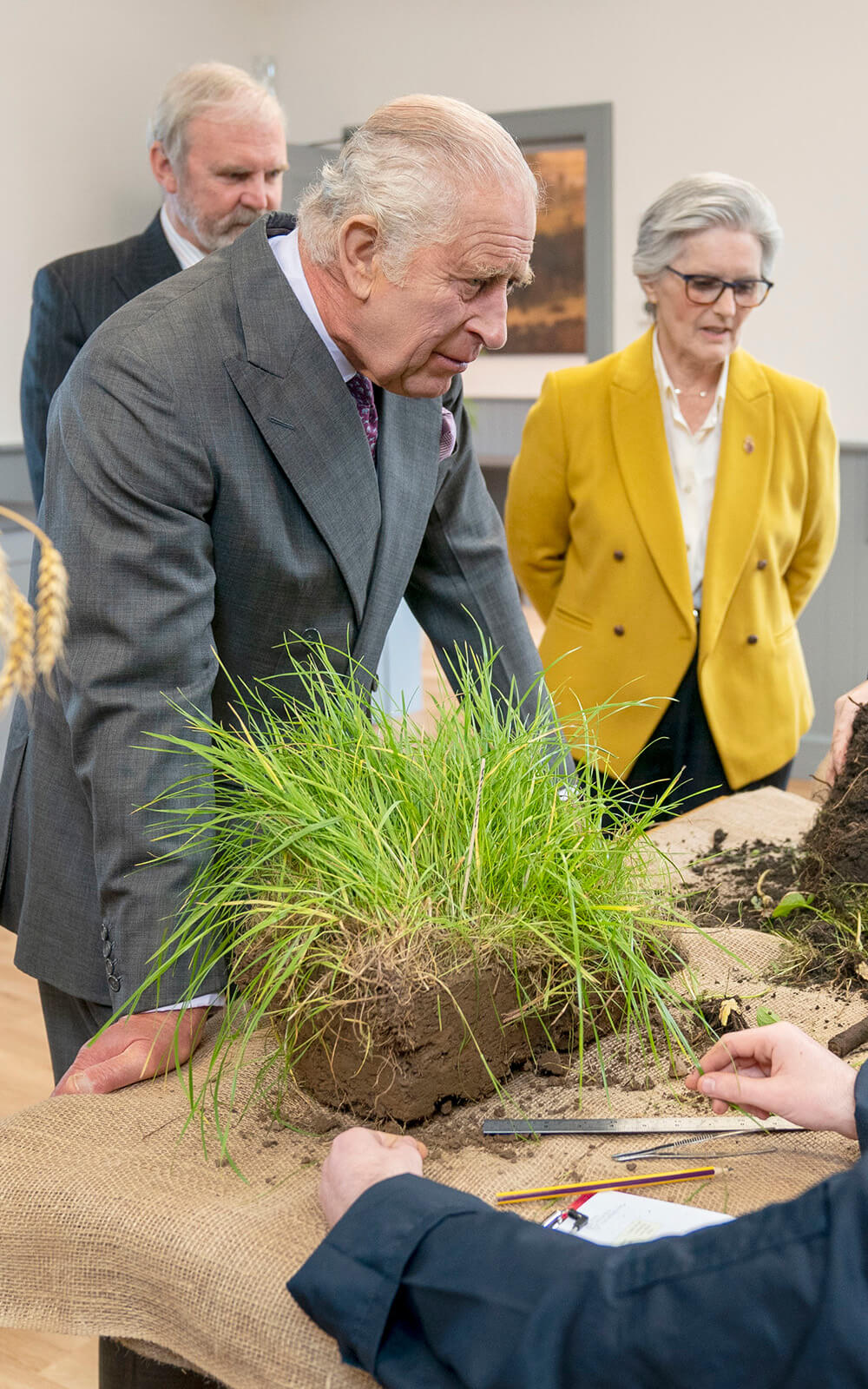 King Charles III meets students carrying out root and soil structure analysis during a visit to officially open the MacRobert Farming and Rural Skills Centre at Dumfries House