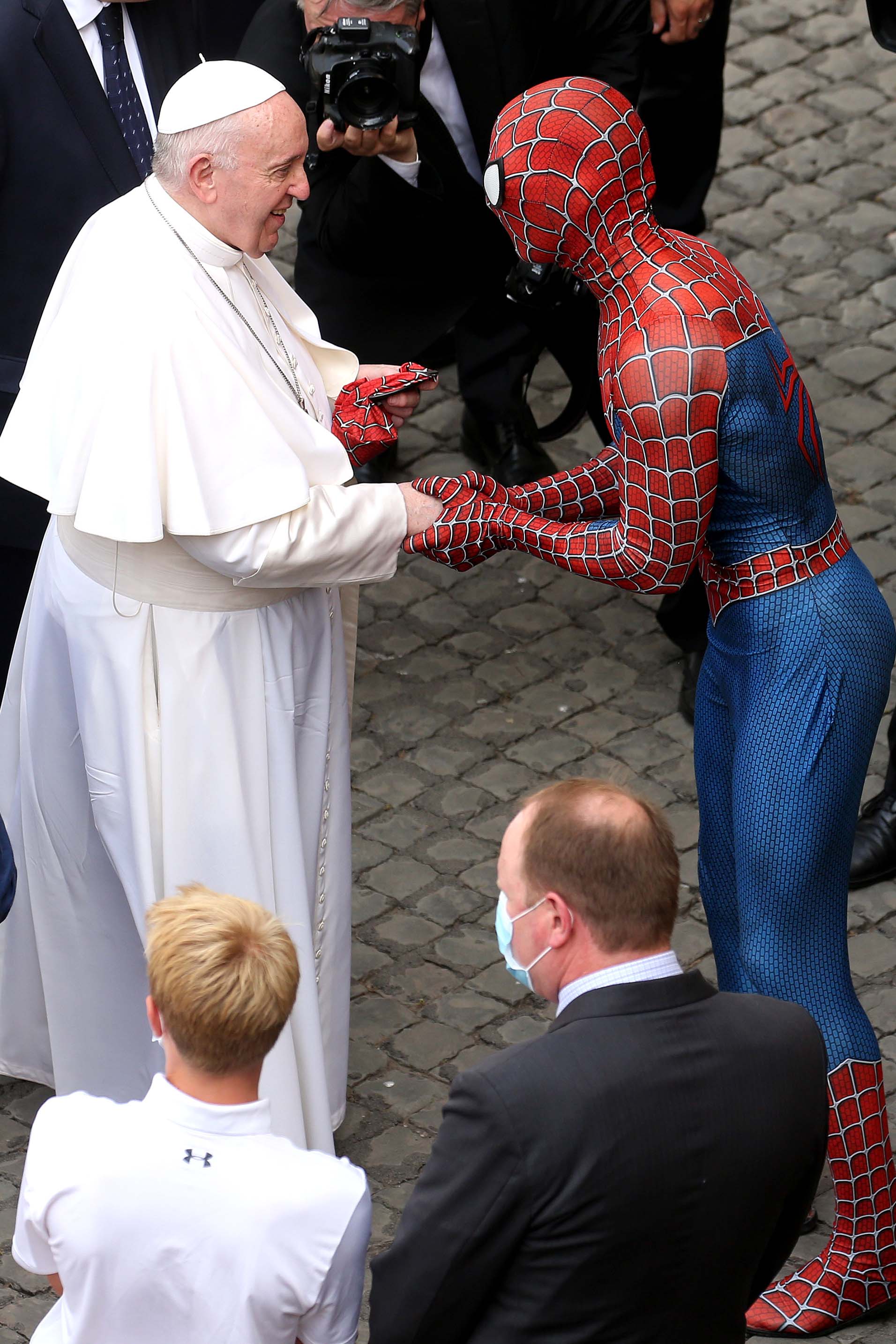 Pope Francis greets Mattia Villardita, who visits children in hospitals dressed as Spider-Man