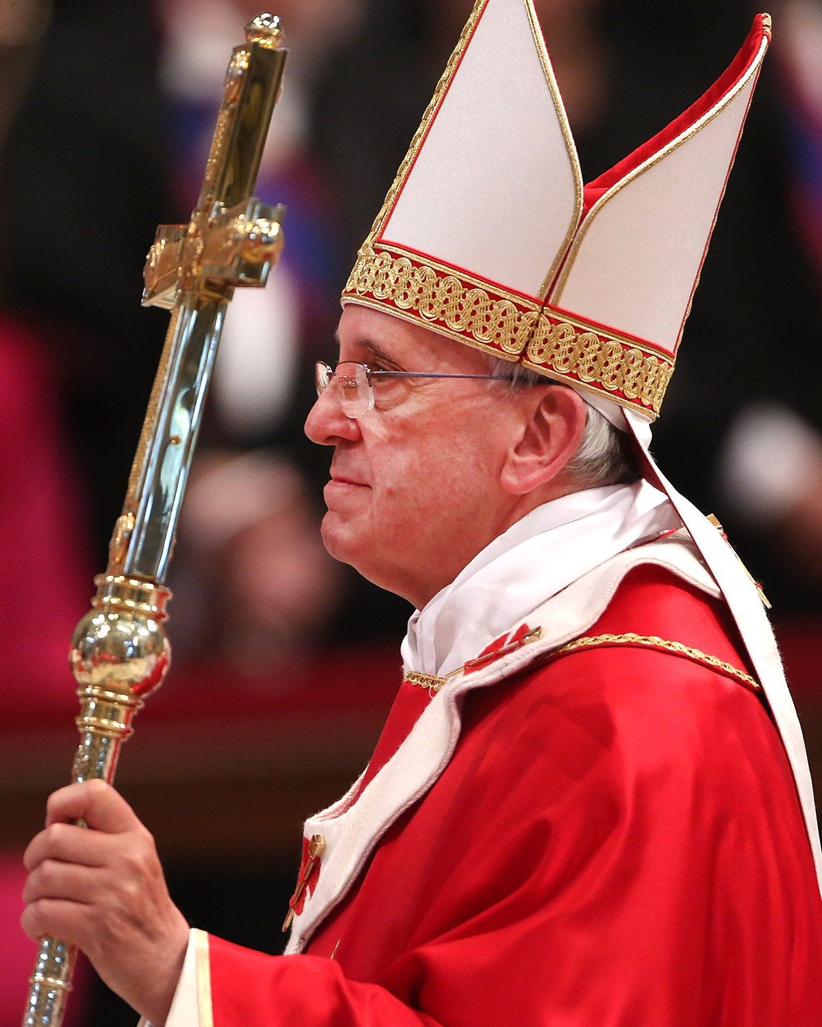 Pope Francis leaves St Peter's Basilica at the end of a mass for the Solemnity of Saint Peter and Paul in 2013