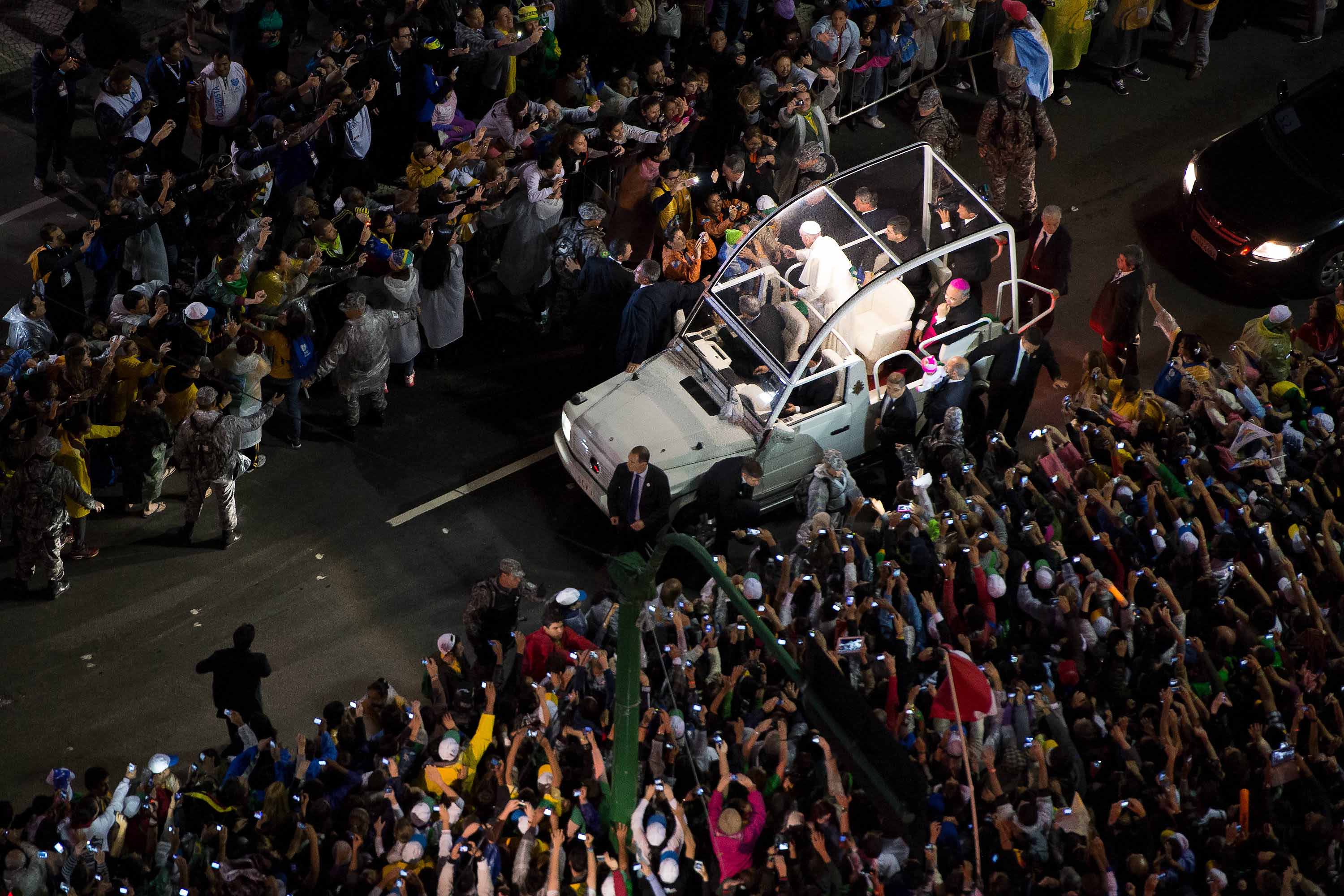 Pope Francis arrives for celebrate Mass at Copacabana beach in 2013 in Rio de Janeiro, Brazil