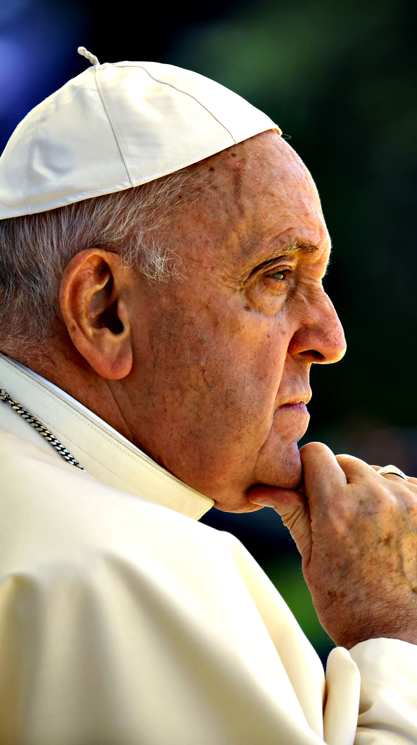 Pope Francis waves to the faithful from the central balcony of St Peter's Basilica in the Vatican on December 25, 2015.