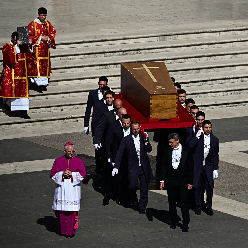 Pallbearers carry the coffin of late Pope Francis during the funeral ceremony in St Peter's Square