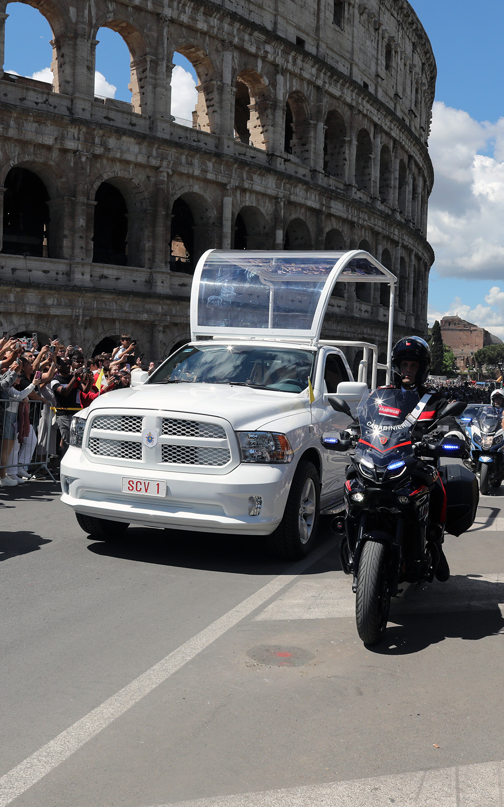 A hearse transfers the coffin of Pope Francis past Rome's Colosseum