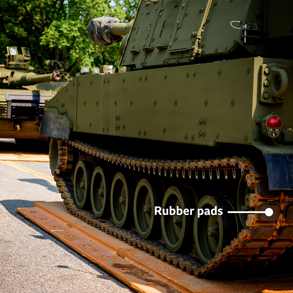US Army soldiers work on a line of tanks at West Potomac Park in Washington DC