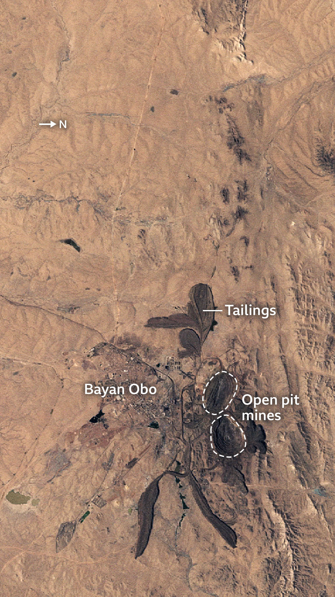 Satellite image shows the Bayan Obo mining area with open pit mines near mining buidlings