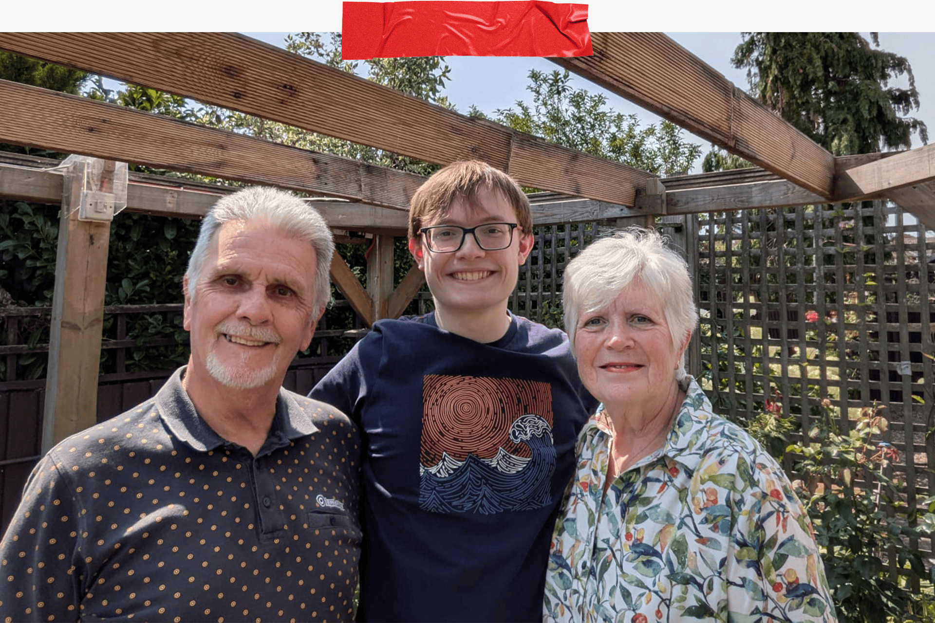 Sam pictured with his grandparents. John (Grandad) on the left, Sam in the middle and Rachel (Nan) to the right