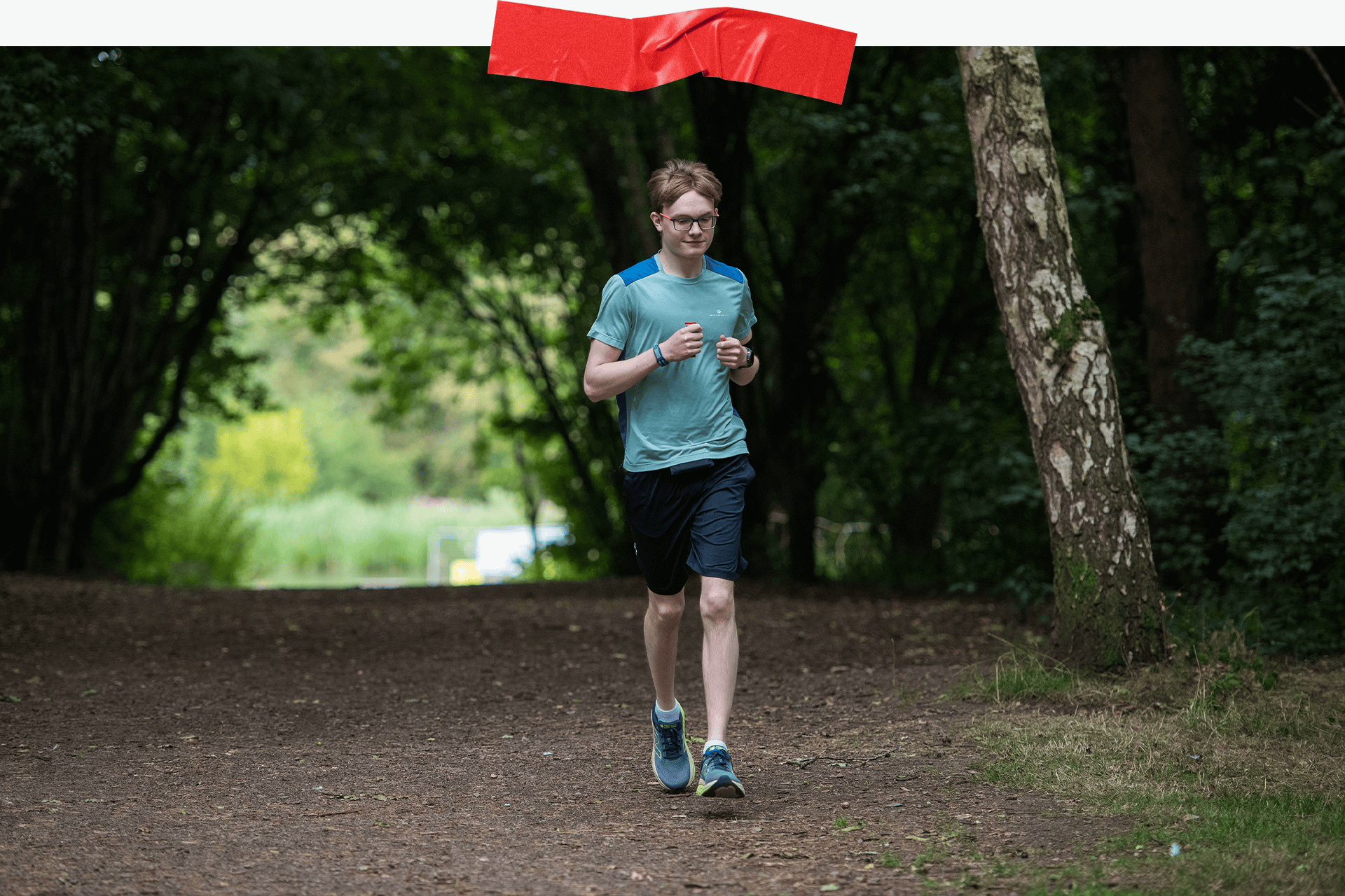 Sam running in a forest 