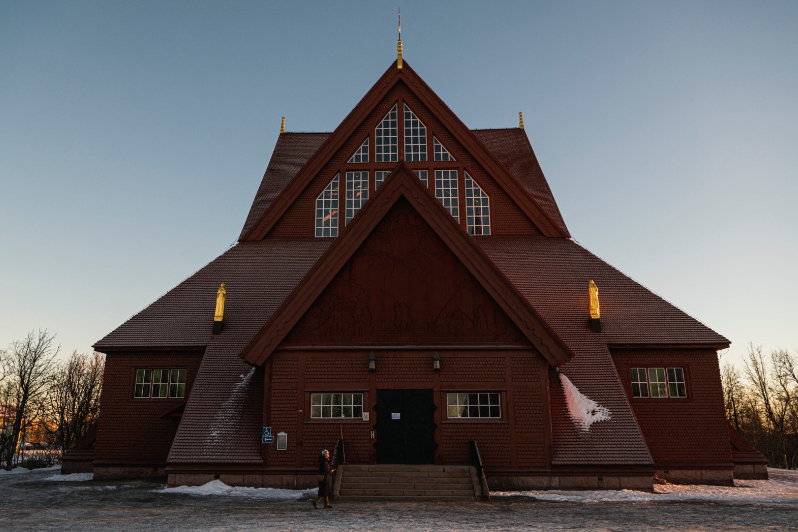 Large red wooden church, considered one of Sweden's most beautiful buildings, pictured near the old city centre of Sweden's northern town, Kiruna