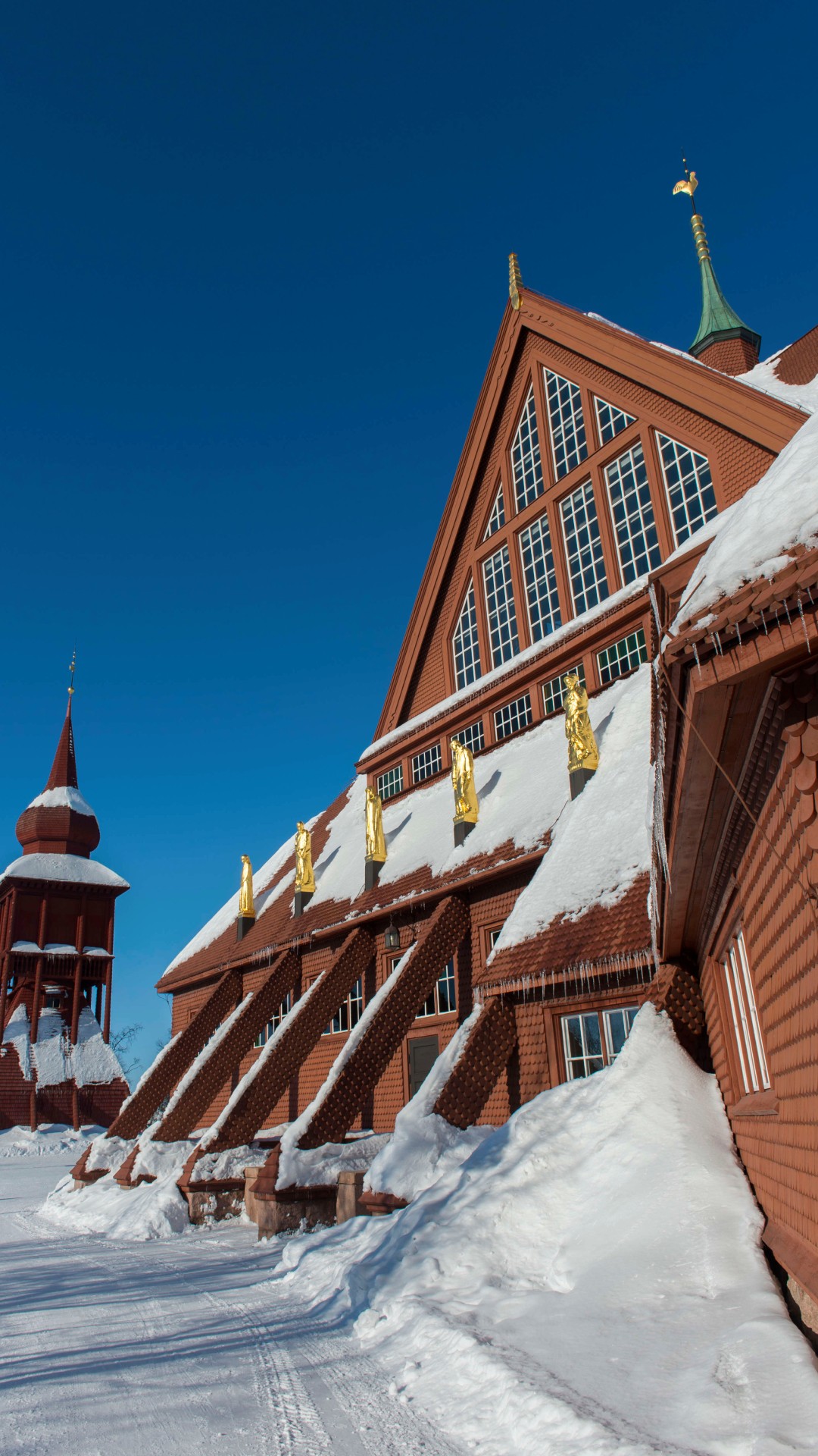 Large red wooden church, considered one of Sweden's most beautiful buildings, pictured near the old city centre of Sweden's northern town, Kiruna
