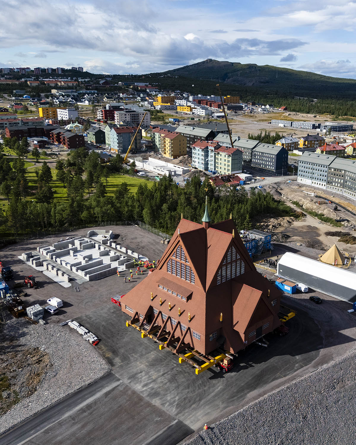 Aerial view of the church transport approaching the new foundations