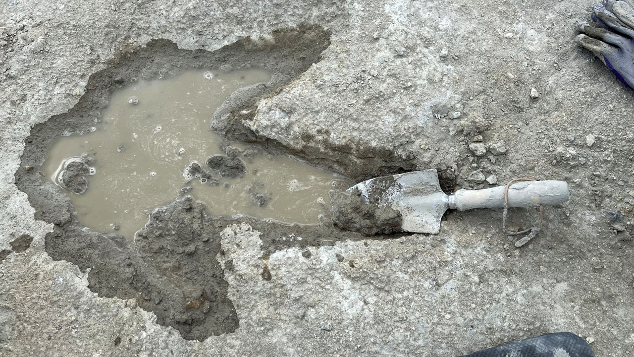 The distinctive three-toed foot of a megalosaurus in a fossilised footprint.
