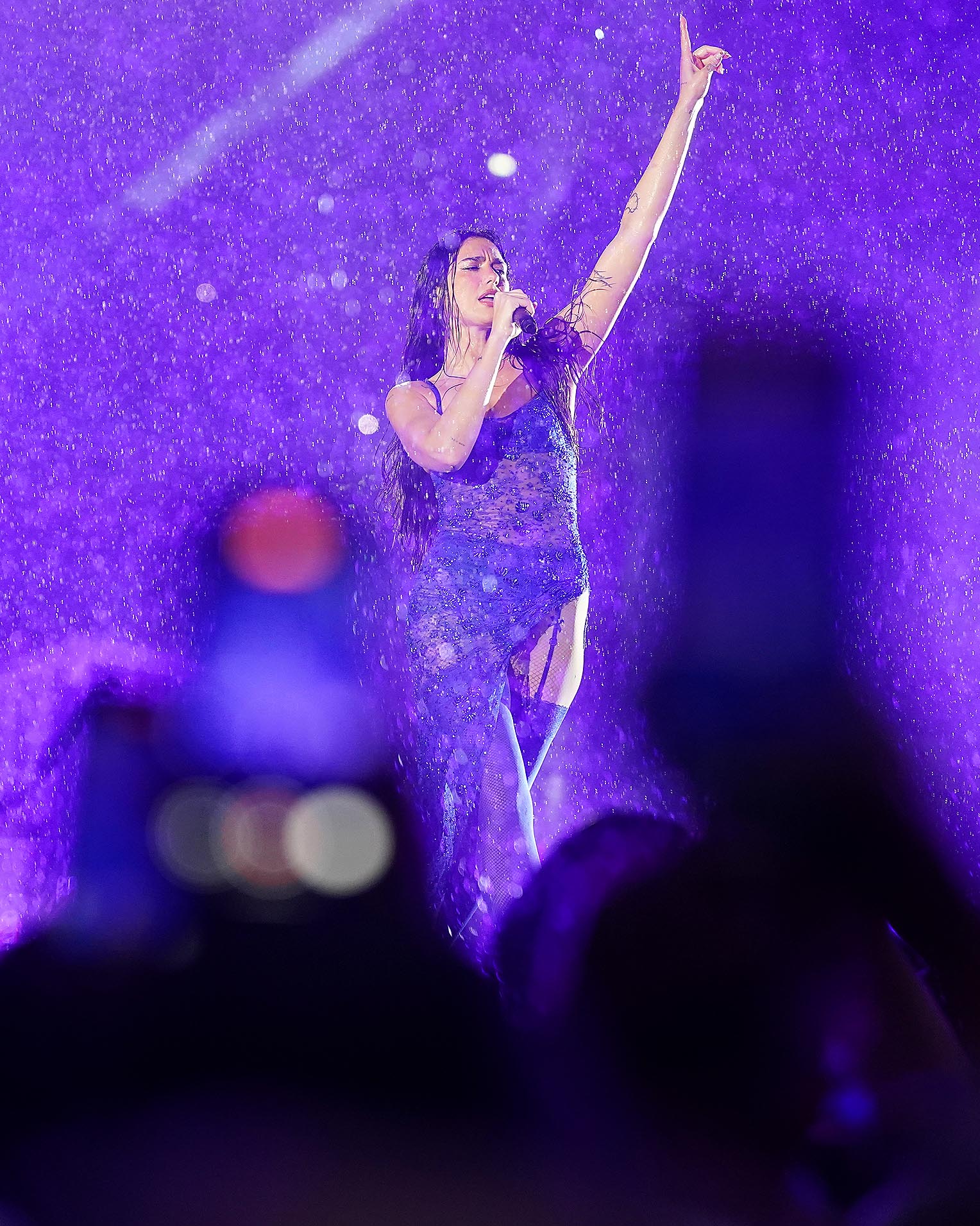 Dua Lipa performing at Anfield in Liverpool