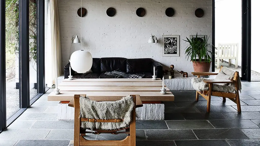 Interior with wooden staircase and blue walls (Credit: Richard Powers/ The Iconic Nordic House)
