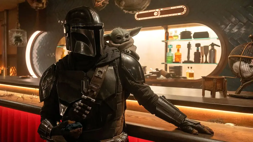 Meryl Streep in a red gown next to Stanley Tucci in The Devil Wears Prada 2 (Credit: 20th Century Fox)